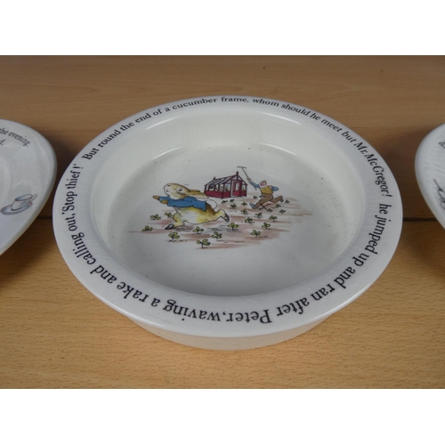 609 - A Wedgwood pottery Peter Rabbit bowl and two other plates.