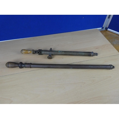 610 - Two antique brass bicycle pumps.