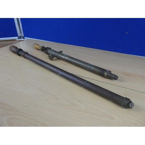 610 - Two antique brass bicycle pumps.