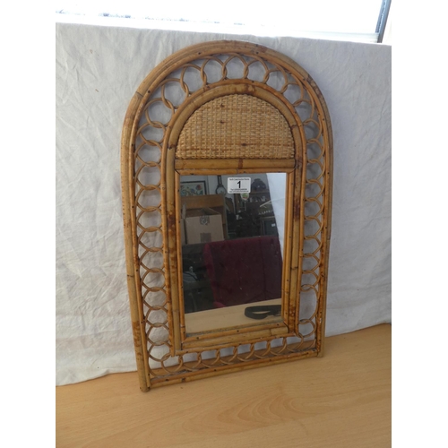 1 - A vintage bamboo and rattan framed mirror, measuring 34cm x 55cm.