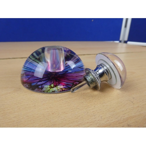 11 - A stunning glass perfume bottle.