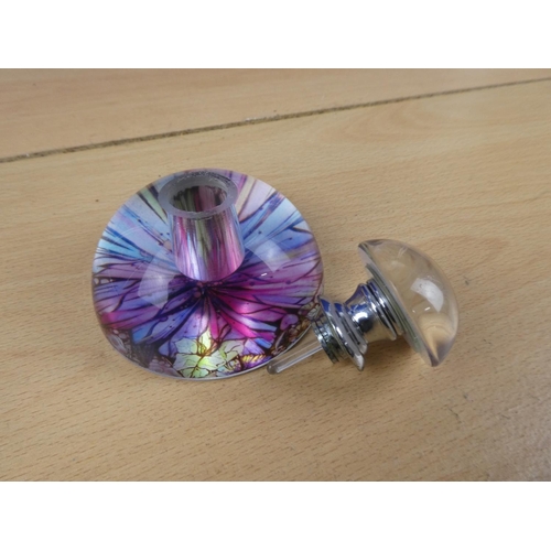 11 - A stunning glass perfume bottle.