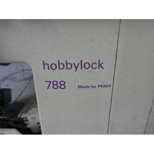 32 - A Hobbylock 788 sewing machine (untested).