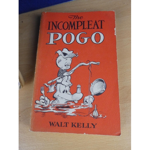 55 - A collection of vintage books featuring Walt Kelly's famous creation Pogo and his friends