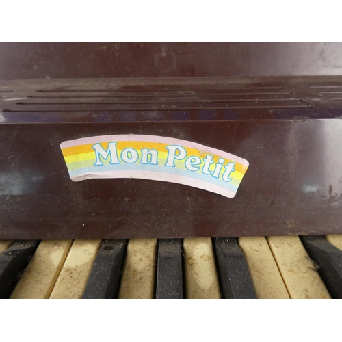 58 - A vintage Mont Petit child's organ.