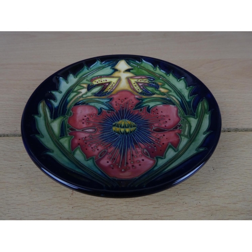 89 - A small Moorcroft plate.