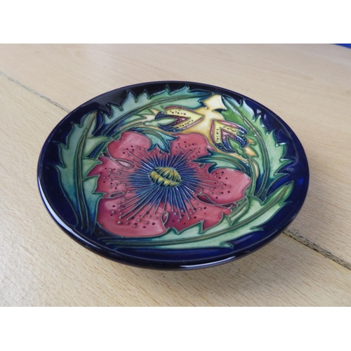 89 - A small Moorcroft plate.