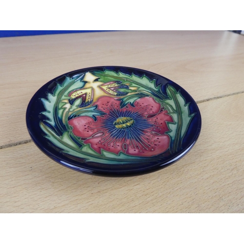 89 - A small Moorcroft plate.