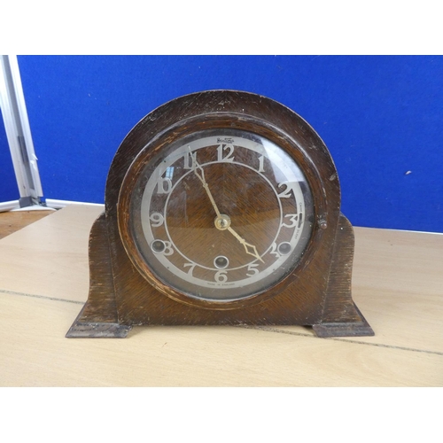 92 - A vintage wooden cased Bentina mantle clock.