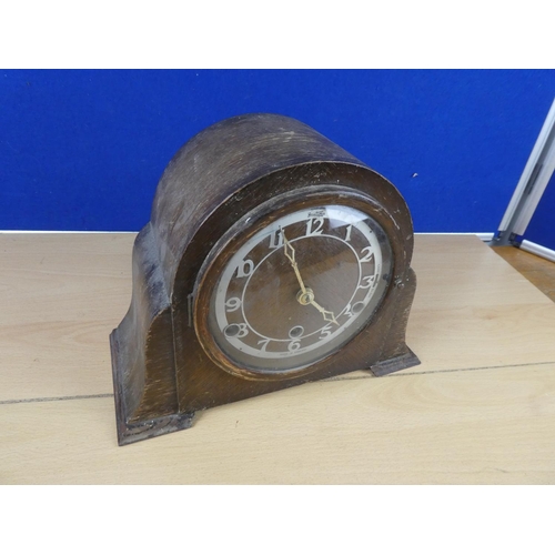 92 - A vintage wooden cased Bentina mantle clock.