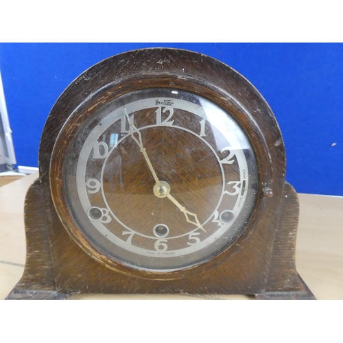 92 - A vintage wooden cased Bentina mantle clock.