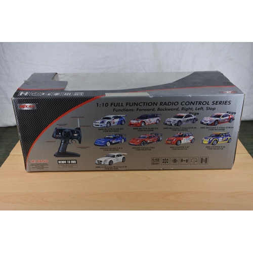 214 - A boxed Mjxric full function radio control series car, scale 1:10.