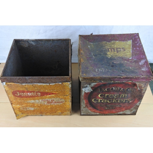 235 - Two large vintage tins.