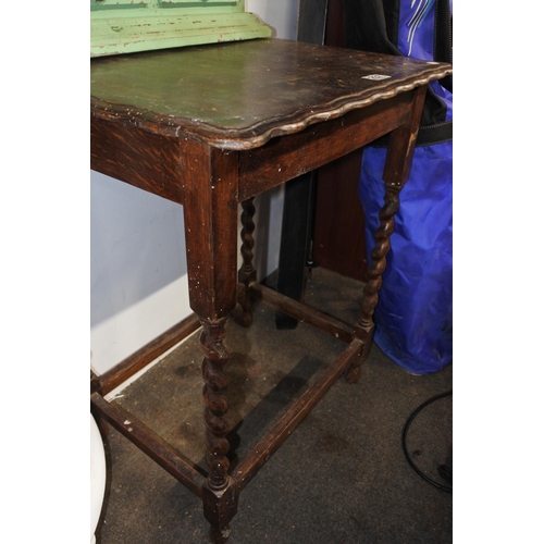 237 - An oak barley twist legged occasional table, measuring 58cm x 74cm x 46cm in size.