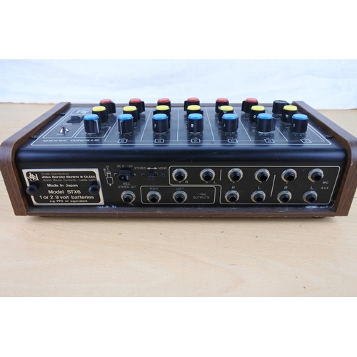 239 - A vintage John Hornby Skewes SXT6 stereo mixer.