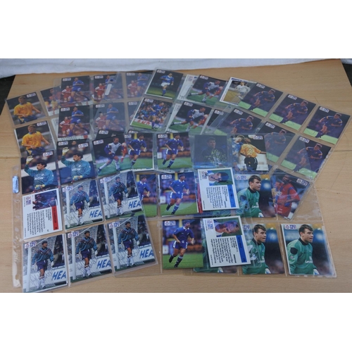 243 - A large lot of collectors football cards with signatures.