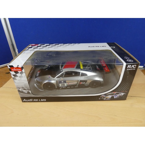 104 - A boxed Rastar Audi R8LMS scale 1:14.