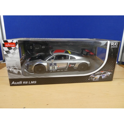 104 - A boxed Rastar Audi R8LMS scale 1:14.