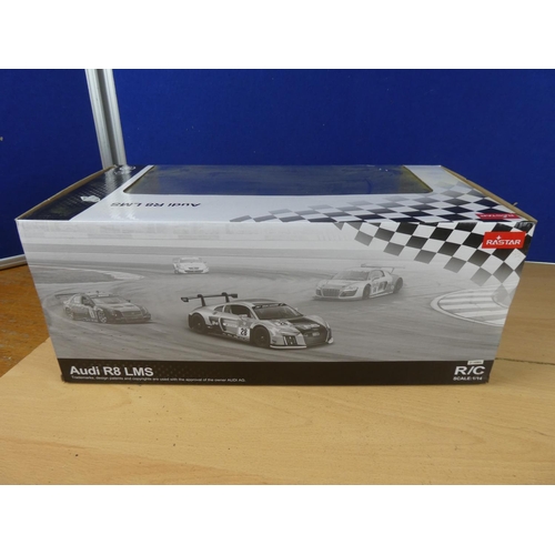 104 - A boxed Rastar Audi R8LMS scale 1:14.