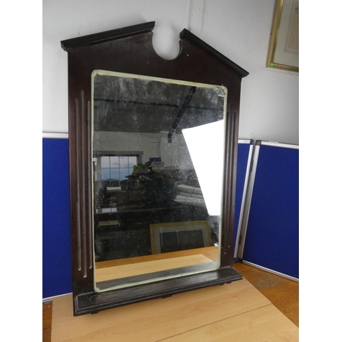 107 - A mahogany framed wall mirror (a/f), measuring 65cm x 98cm approximately.