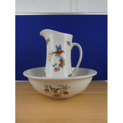 125 - A stunning antique Empire Ware pottery jug and basin set.