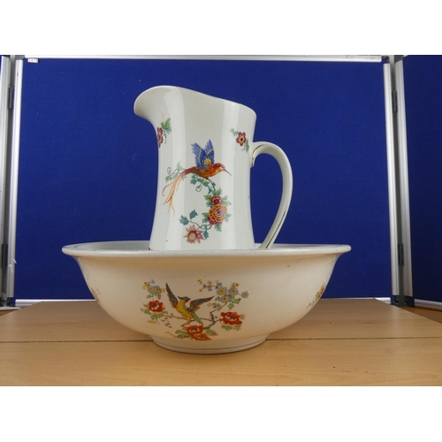 125 - A stunning antique Empire Ware pottery jug and basin set.