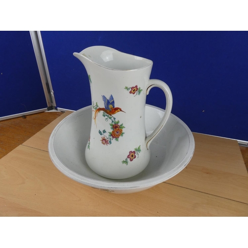 125 - A stunning antique Empire Ware pottery jug and basin set.