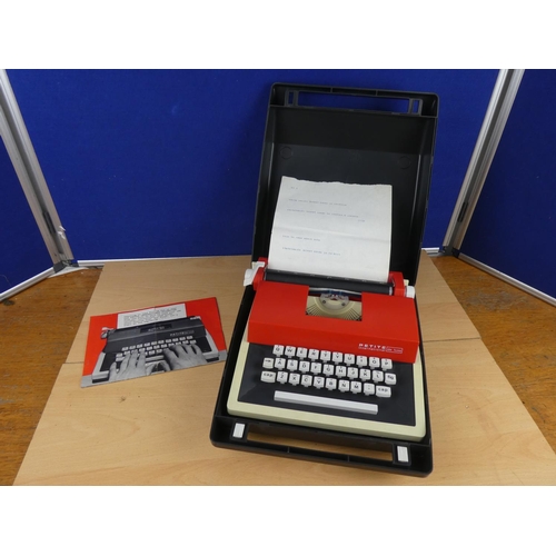 138 - A cased Petite childs typewriter.