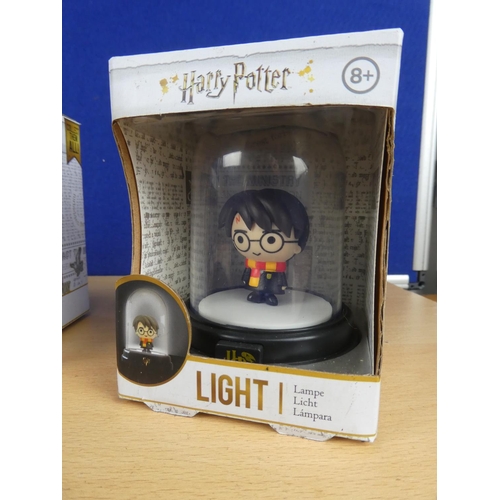 146 - Five boxed Harry Potter lights.