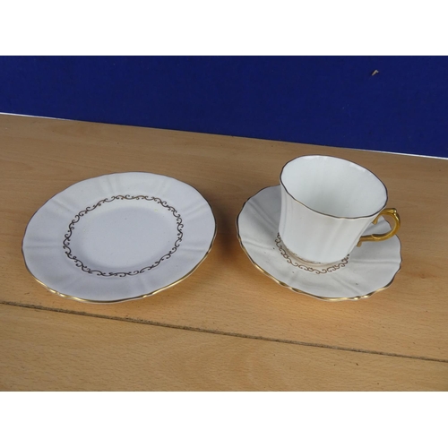 158 - An old Royal bone china trio.