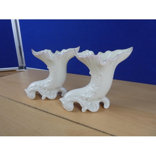 159 - A pair of Belleek vases.