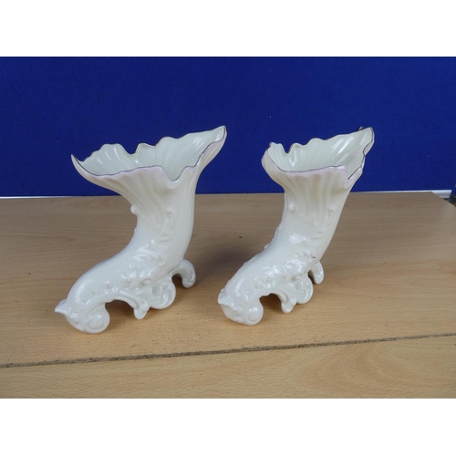 159 - A pair of Belleek vases.