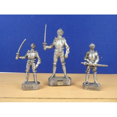 161 - Three plastic armoured soldiers.