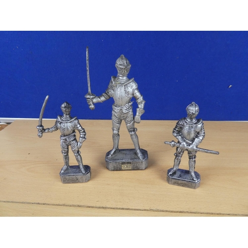 161 - Three plastic armoured soldiers.