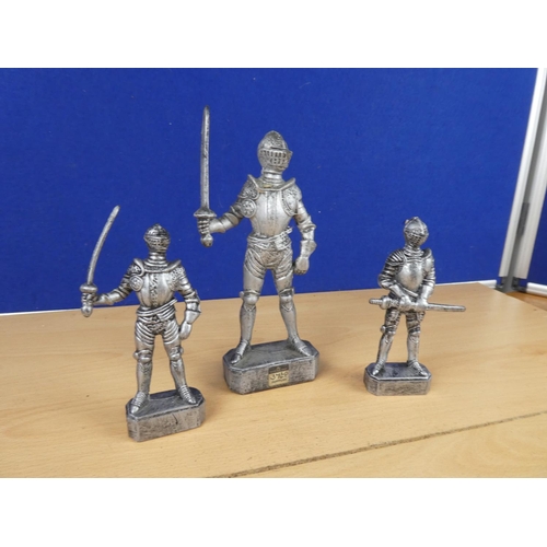 161 - Three plastic armoured soldiers.