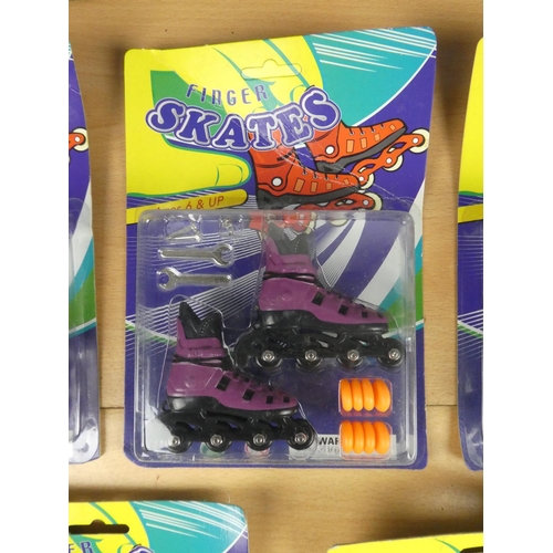 182 - A lot of boxed finger skate toys.