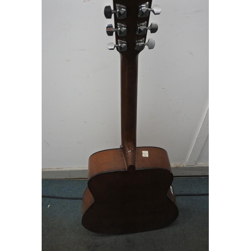 84 - A Yamaha acoustic guitar.