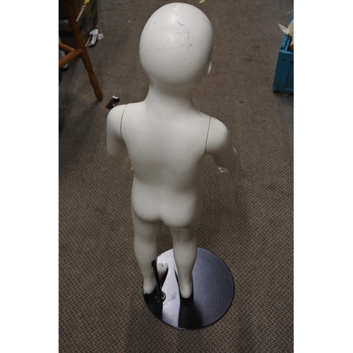 92 - A child's shop dummy display on stand, measuring 96cm in height.