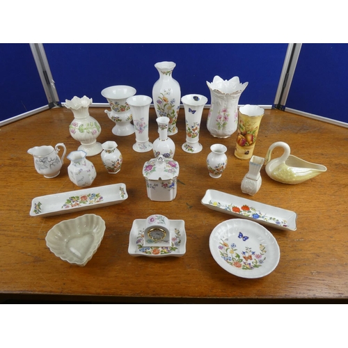 104 - A large collection of pottery to include Belleek, Aynsley Orchard Gold and more.