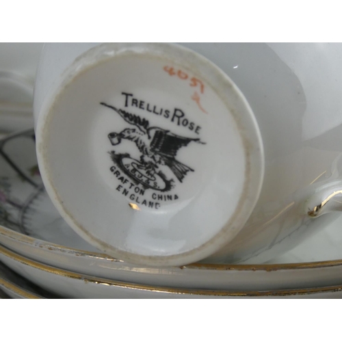 547 - An antique Trellis Rose tea set.