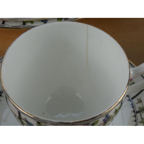 547 - An antique Trellis Rose tea set.