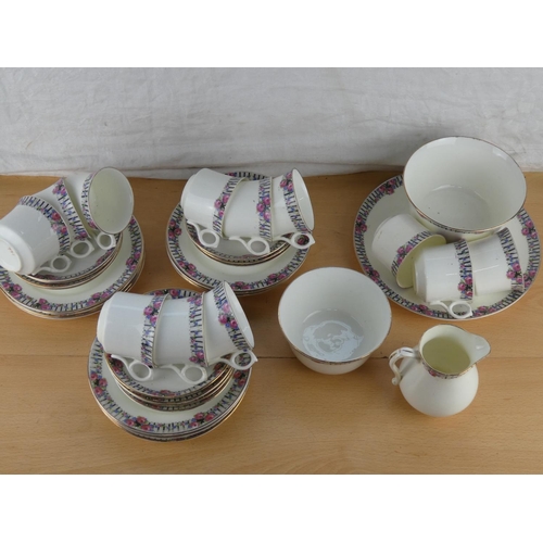 548 - An antique tea set.