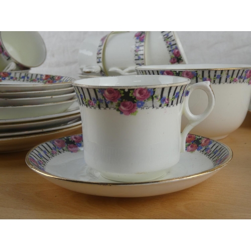 548 - An antique tea set.