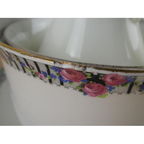 548 - An antique tea set.