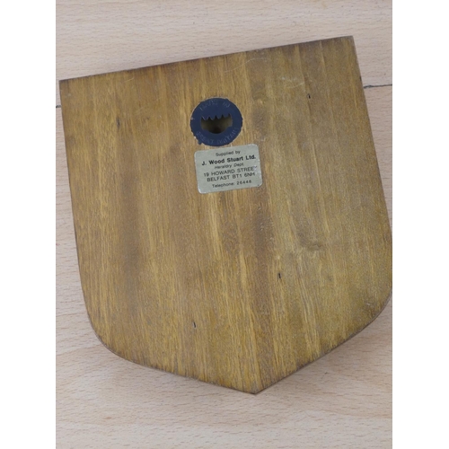 568 - A 1979 North West 200 plaque and a vintage 'Joey Dunlop' souvenir ornament (a/f).