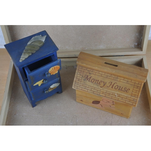 1 - A wooden storage case, a wooden trinket box decorated with shell design and a wooden money box.