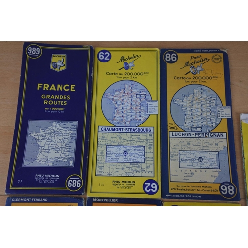 16 - An assortment of vintage Michelin road maps.