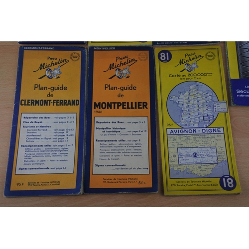 16 - An assortment of vintage Michelin road maps.