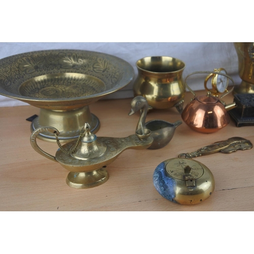 3 - An assorted lot of brass ware to include a miniature antique style coal bucket and more.