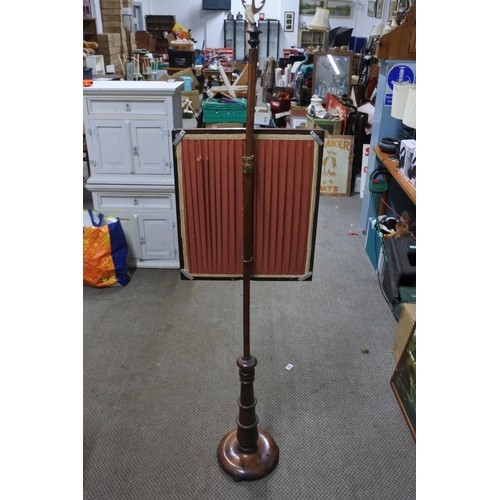 58 - An antique mahogany pole screen with tapestry panel. Approx 62cm tall.